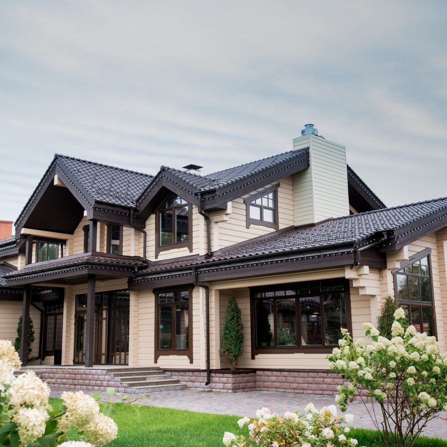 View of luxurious modern house with decorative elements around windows