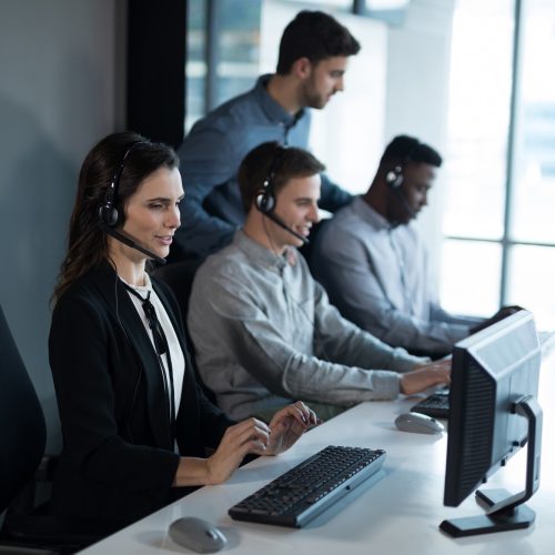 customer-service-executive-trainer-monitoring-her-team